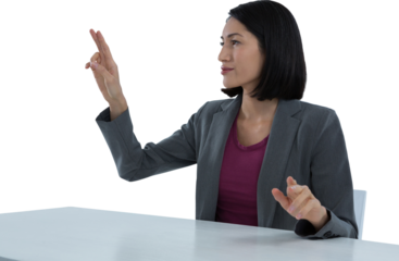 Businesswoman touching invisible screen