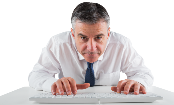 Mature businessman typing on keyboard