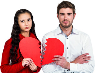 Couple holding heart halves