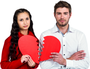 Couple holding heart halves