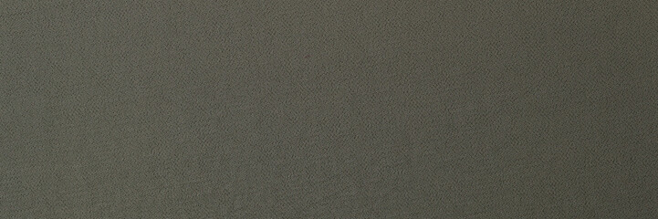 Dark gray fabric background closeup. Abstract gray background