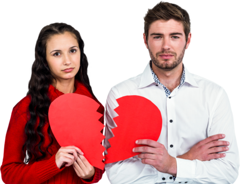 Couple holding heart halves
