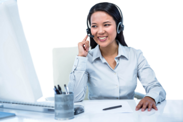 Smiling businesswoman using headset