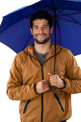 Portrait of smiling man holding blue umbrella