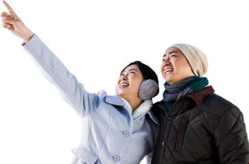 Happy woman pointing finger with boyfriend