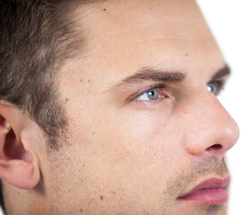 Close-up of man wearing contact lens