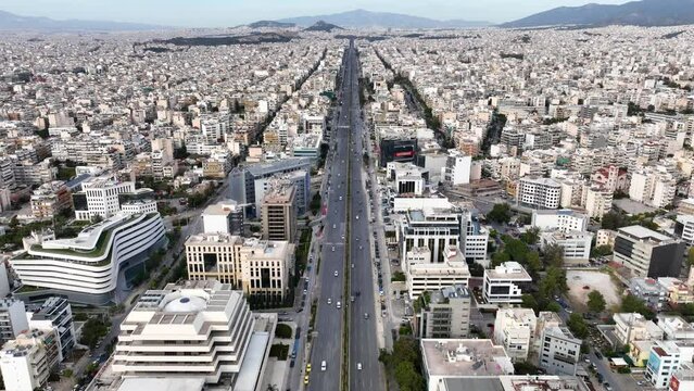 Aerial drone video of landmark buildings in Syggrou Avenue urban cityscape, Athens centre, Attica, Greece