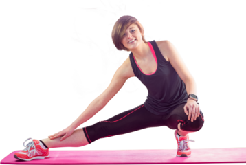 Portrait of smiling fit woman doing stretching exercise on mat
