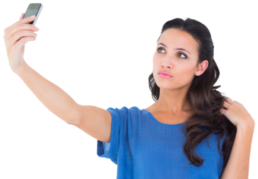 Pretty brunette taking a selfie