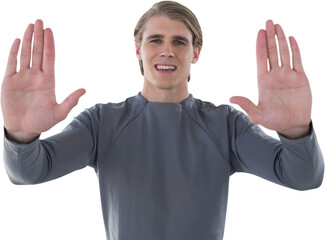 Portrait of smiling young businessman gesturing against white background