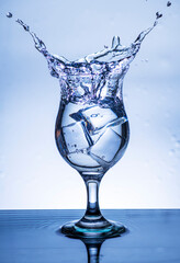 The image of pouring drinking water, into a glass,