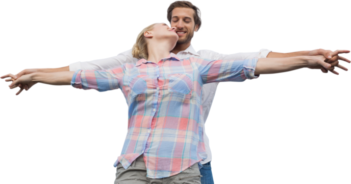 Man and woman standing with arms outstretched