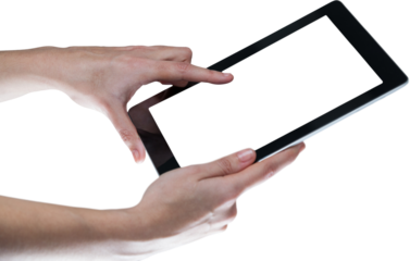 Hands using digital tablet against white background