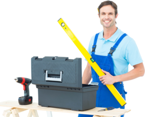 Carpenter holding spirit level at table