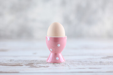 pink egg on table