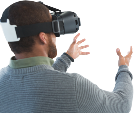 Male executive using virtual reality headset