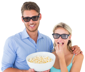 Happy young couple wearing 3d glasses eating popcorn