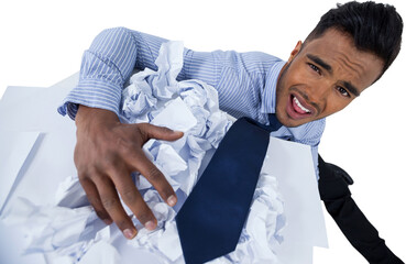 Portrait of unhappy businessman with crumpled paper