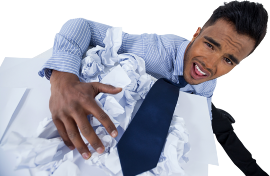Portrait of unhappy businessman with crumpled paper