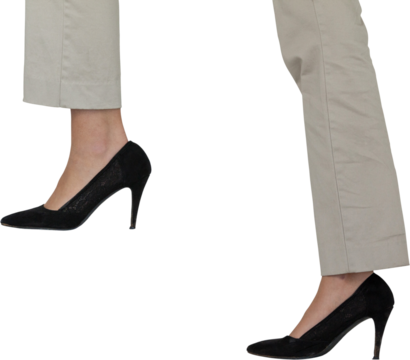 Low section of businesswoman climbing steps