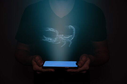 A hologram of a scorpion, which is very venomous and deadly, projected from a mobile phone.
