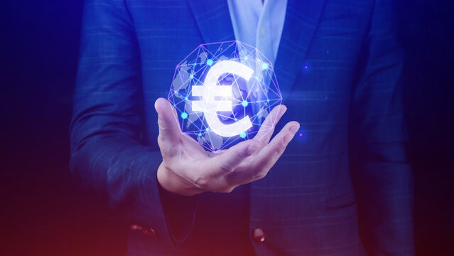 Businessman hands holding with Euro sign on global online networking virtual screen, Online banking currencies exchange financial concept.