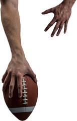 Cropped image of American football player holding ball