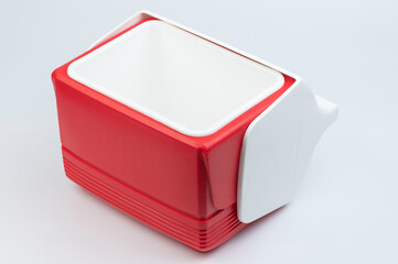Red open plastic lunch box - Powered by Adobe