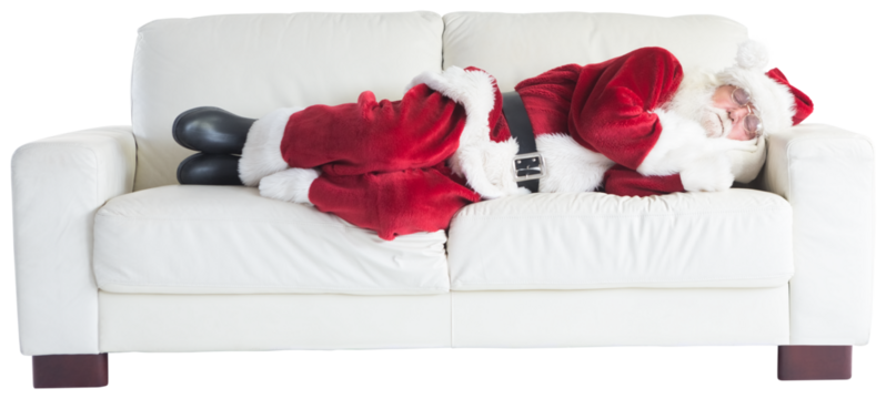 Father Christmas sleeps on a couch - Powered by Adobe