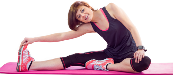 Portrait of woman doing stretching exercise on mat