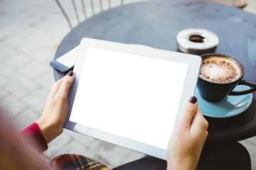 Woman holding digital tablet