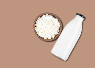 Farm milk in bottle and cottage cheese. The concept of healthy and dietary nutrition. Fermented product.