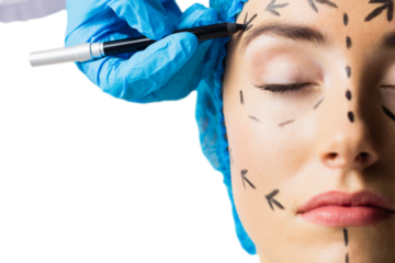 Peaceful young patient with dotted lines on the face