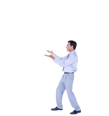 Side view of businessman gesturing on white background