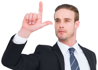 Attentively businessman in suit pointing up 