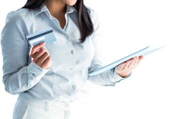 Businesswoman holding laptop and credit card