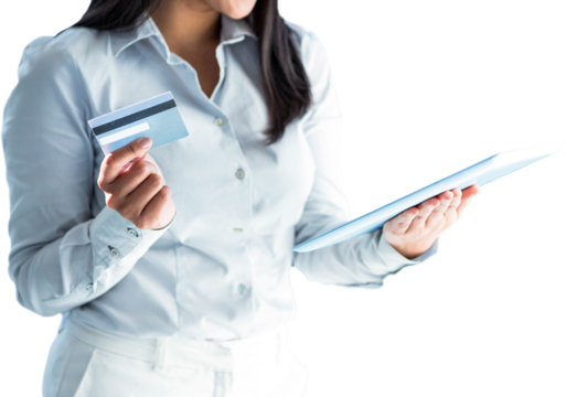 Businesswoman holding laptop and credit card