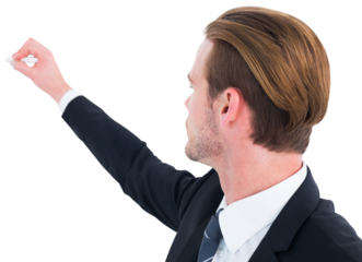 Well dressed businessman writing with chalk