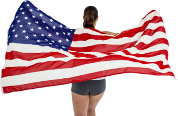 Rear view of woman holding American flag