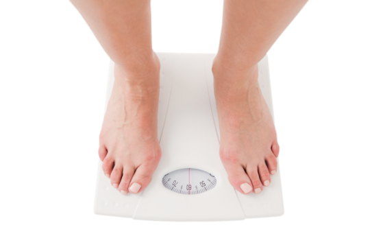  Womans feet on scales