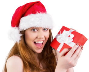 Festive redhead holding a gift