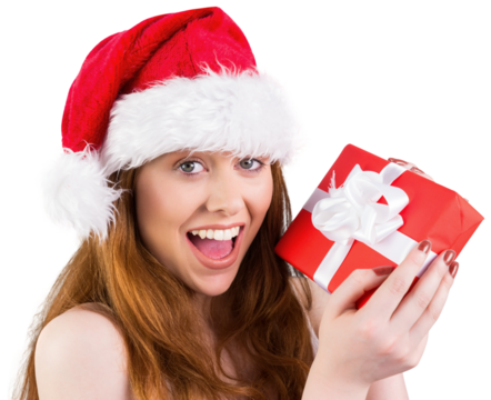 Festive redhead holding a gift