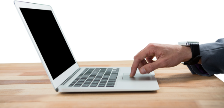 Cropped hand of businessman using laptop