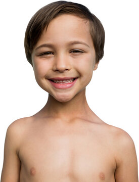 Portrait of smiling shirtless boy with brown hair