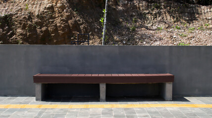 Concrete semen and wood outdoor bench park.
