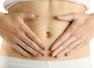 Slim woman touching her belly