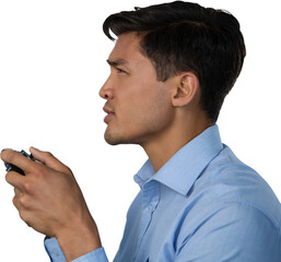 Side view of young businessman playing video game