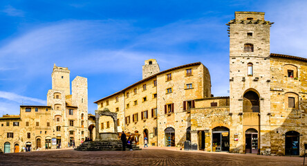 Fototapeta premium historic buildings at the old town of San Gimignano in italy