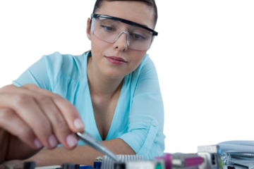 Female computer engineer repairing motherboard