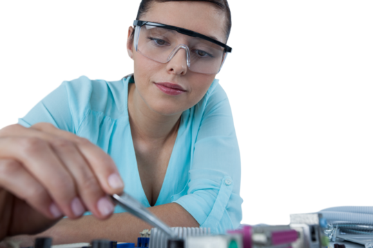 Female computer engineer repairing motherboard